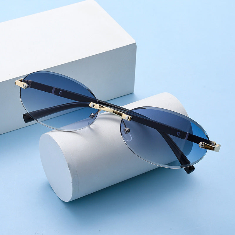 Trimming Oval Frame Sunglasses Frameless Hot Girl Sunglasses - X2-Shopping